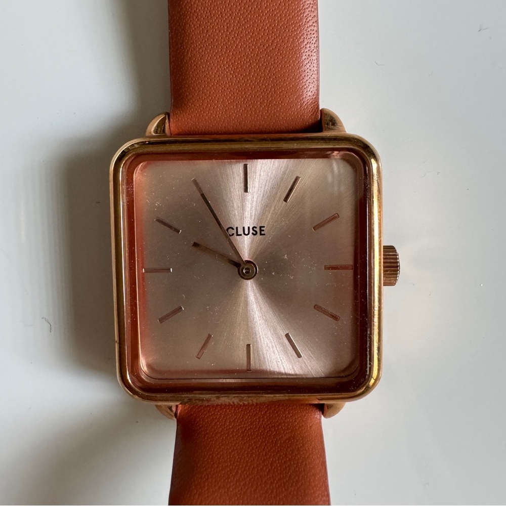 Square face watch with brick red leather straps